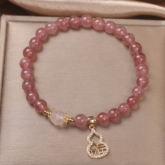 Pulsera con dije positivo de calabaza de cuarzo fresa y piedras de Buda