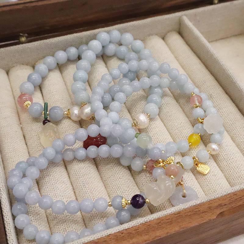 Pulsera con dije de gato, calabaza, conejo y calcedonia natural de aguamarina y piedras de Buda