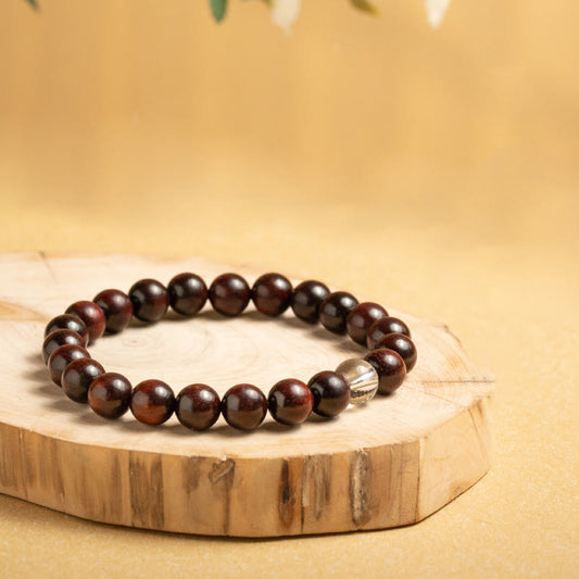 Pulsera protectora de sándalo rojo con hojas pequeñas y cristales blancos de Buda