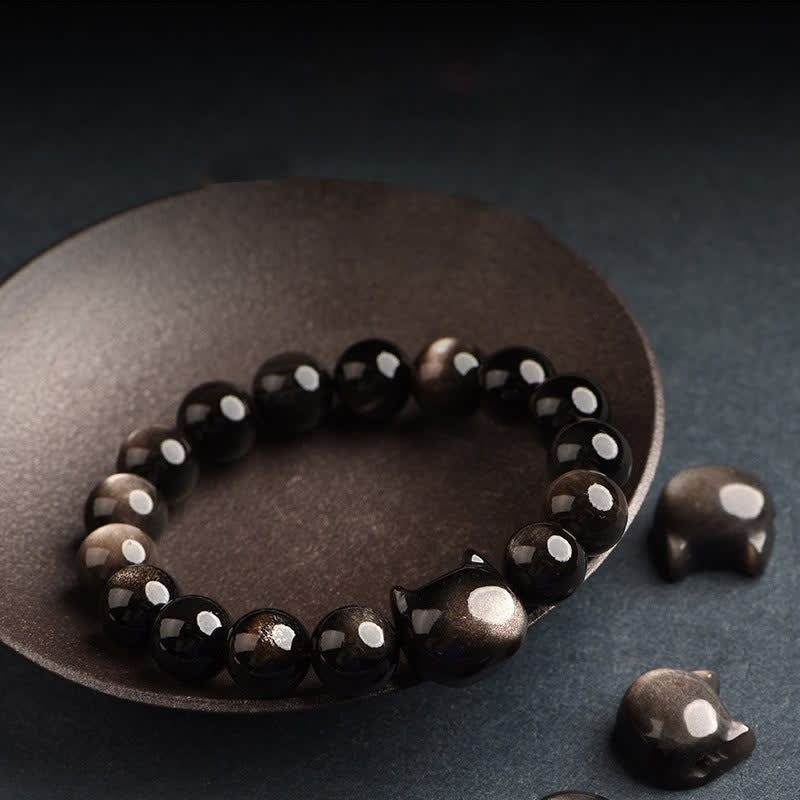 Pulsera de protección con piedras de Buda, obsidiana dorada y obsidiana plateada con brillo, con forma de pata de gato de la suerte.