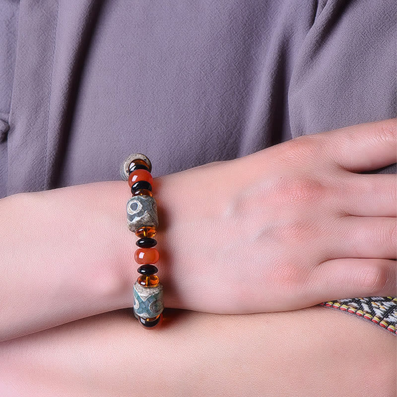 Pulsera tibetana de cuentas Dzi de tres ojos con piedras de Buda y ágata para la protección y la felicidad