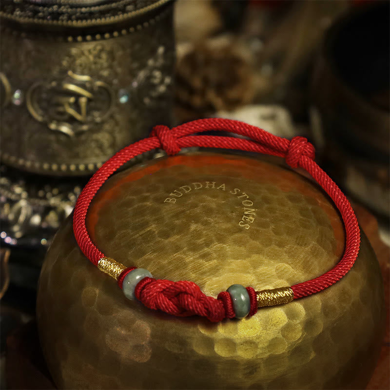 Pulsera trenzada con nudo de la fortuna y jade rojo de Buda