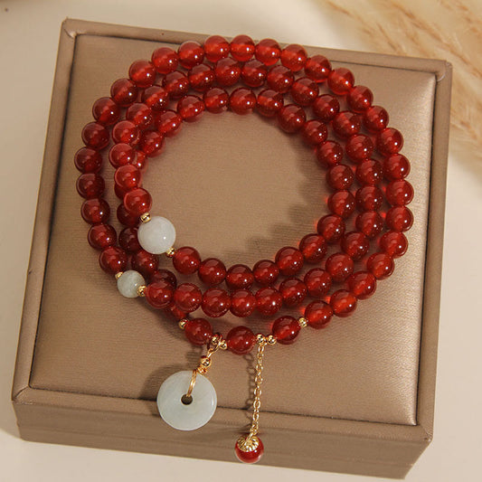 Pulsera de triple vuelta con hebilla de paz y jade de ágata roja natural de Buddha Stones