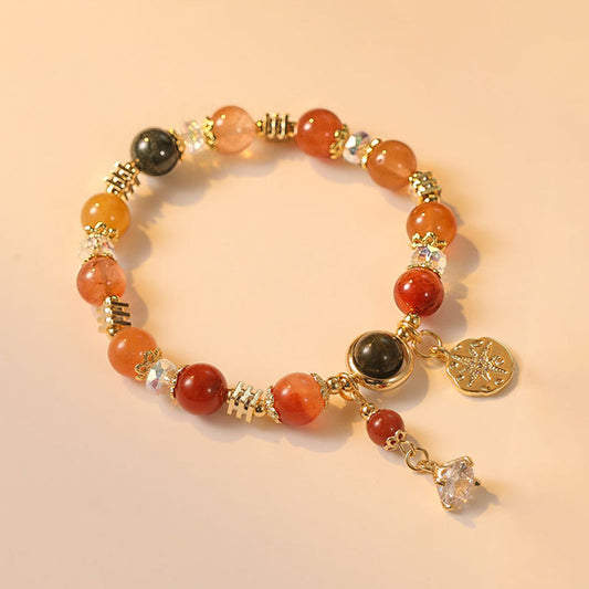 Pulsera de la riqueza con flor de estrella de ocho puntas de cuarzo rutilado multicolor natural de Buddha Stones