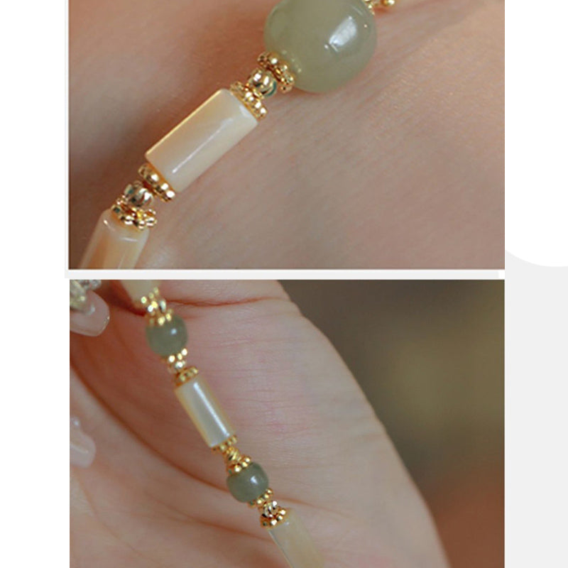 Pulsera con cuentas de jade hetian, piedra Tridacna, chapada en oro de 14 quilates y diseño de bambú.