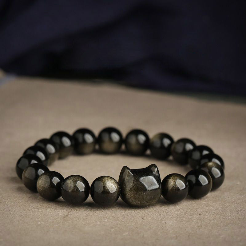 Pulsera de protección con piedras de Buda, obsidiana dorada y obsidiana plateada con brillo, con forma de pata de gato de la suerte.
