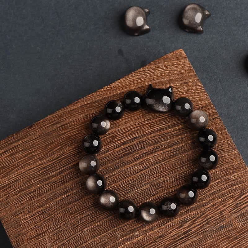 Pulsera de protección con piedras de Buda, obsidiana dorada y obsidiana plateada con brillo, con forma de pata de gato de la suerte.