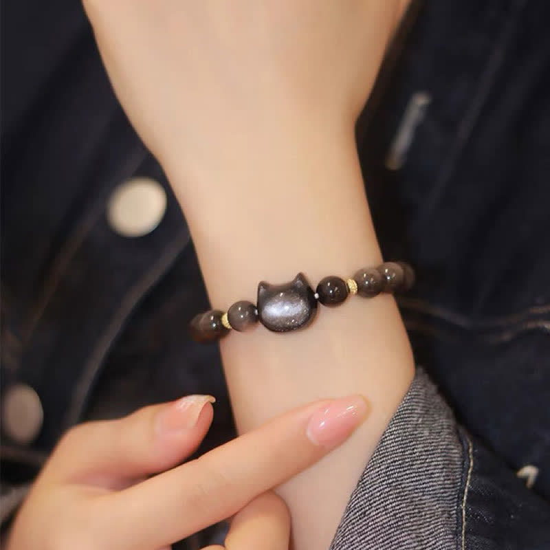 Pulsera de protección con piedras de Buda, obsidiana dorada y obsidiana plateada con brillo, con forma de pata de gato de la suerte.