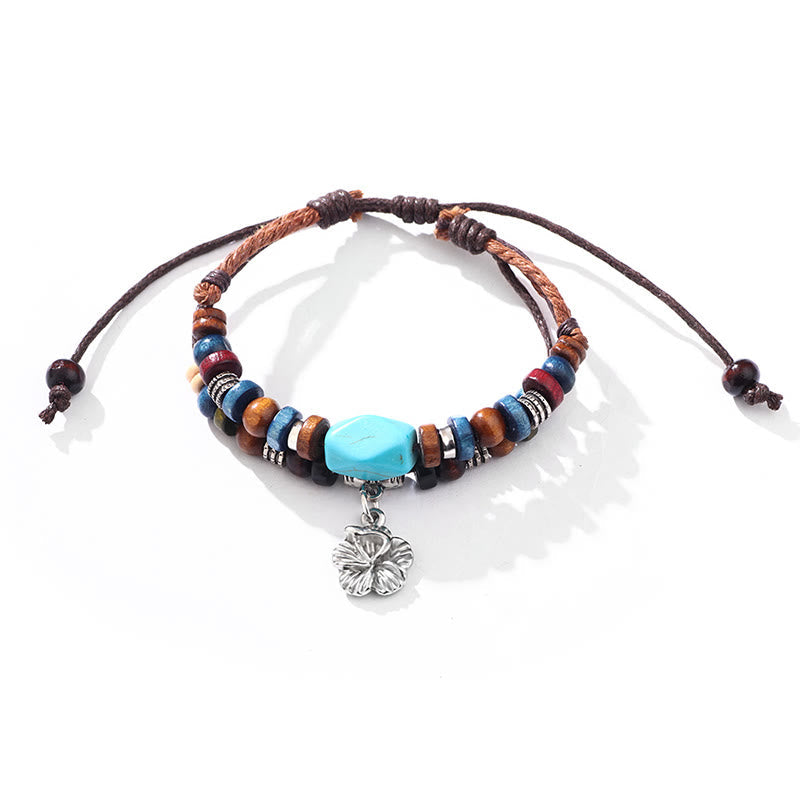 Pulsera con colgante de doble capa con protección de pequeñas flores turquesas y piedras de Buda