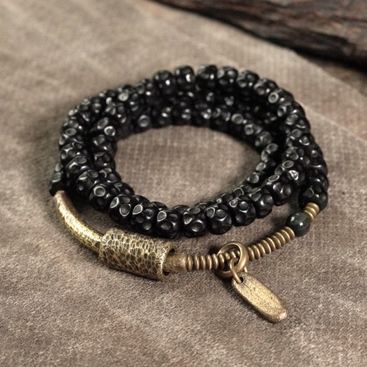 Pulsera de triple vuelta de cobre con cáscara de coco retro de Buddha Stones