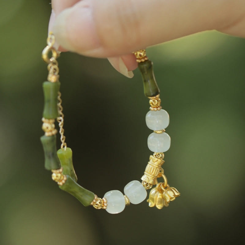 Pulsera de la riqueza con piedras de Buda, bambú verde, jade y lirio de los valles