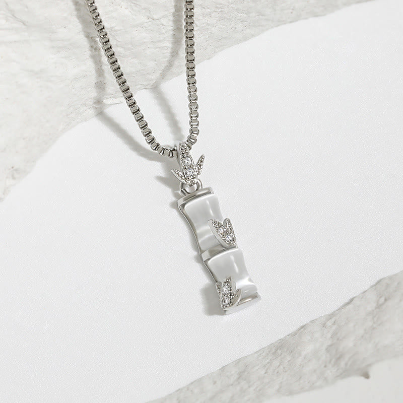 Collar con colgante de armonía con diseño de bambú y calcedonia de piedras de Buda