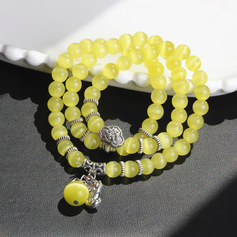 Pulsera triple vuelta con soporte PiXiu de ojo de gato y piedras de Buda