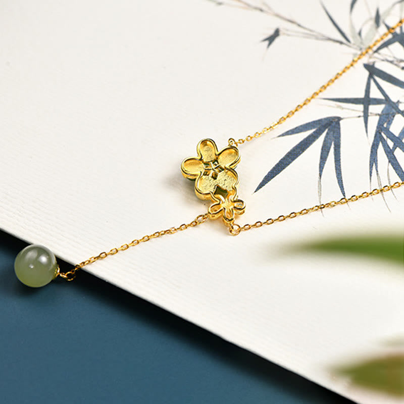 Collar con colgante de la suerte con diseño de flor de ciruelo y jade cian hetiano en plata de ley 925 con piedras de Buda