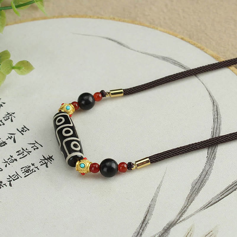 Collar con colgante de hilo con cuentas Dzi tibetanas de nueve ojos y piedras de Buda con bendiciones de protección