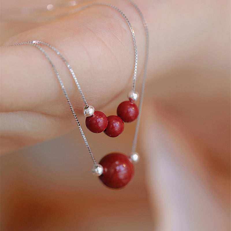 Collar con colgante de bendición de la calma con cuentas de cinabrio de Buda en plata de ley 925