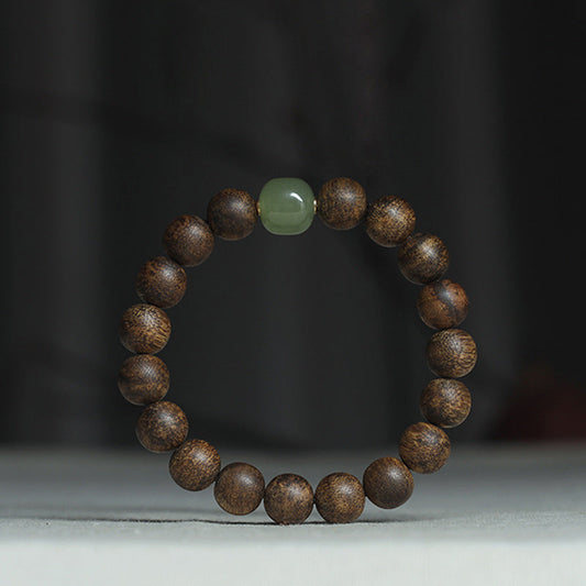Vietnam Huang Qinan Adlerholz Hetian Jade Friedensstärke Armband