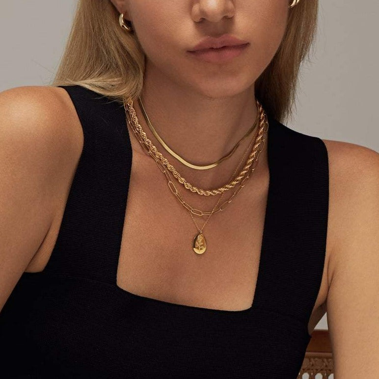 Collar de moneda ovalada Fleur