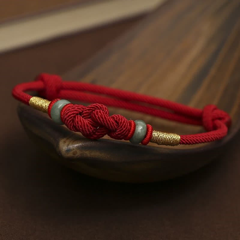 Pulsera trenzada con nudo de la fortuna y jade rojo de Buda