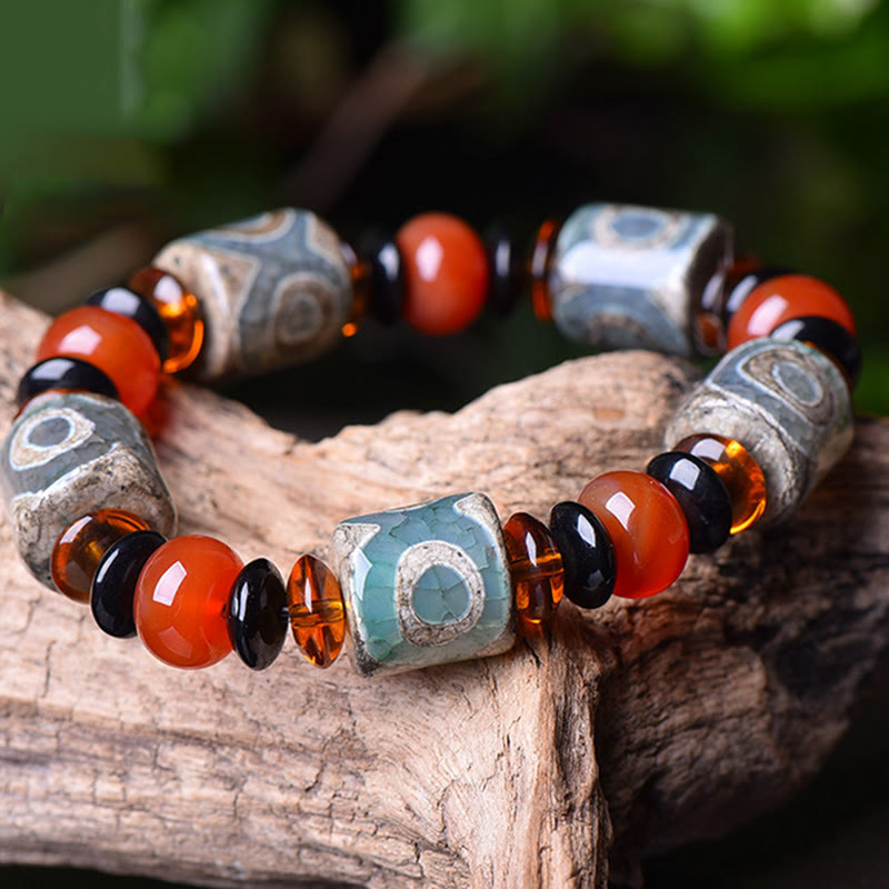 Pulsera tibetana de cuentas Dzi de tres ojos con piedras de Buda y ágata para la protección y la felicidad