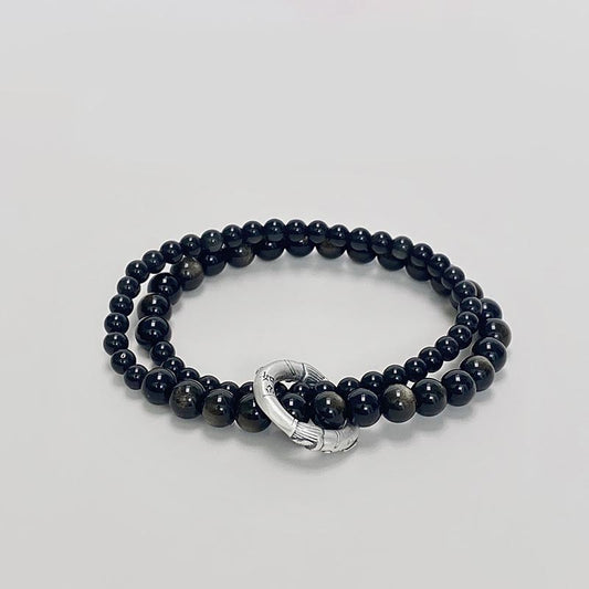 Pulsera de doble capa con obsidiana negra y piedras de Buda en plata de ley 999.