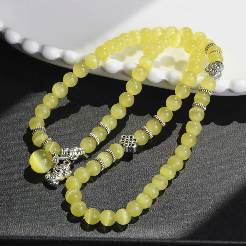 Pulsera triple vuelta con soporte PiXiu de ojo de gato y piedras de Buda