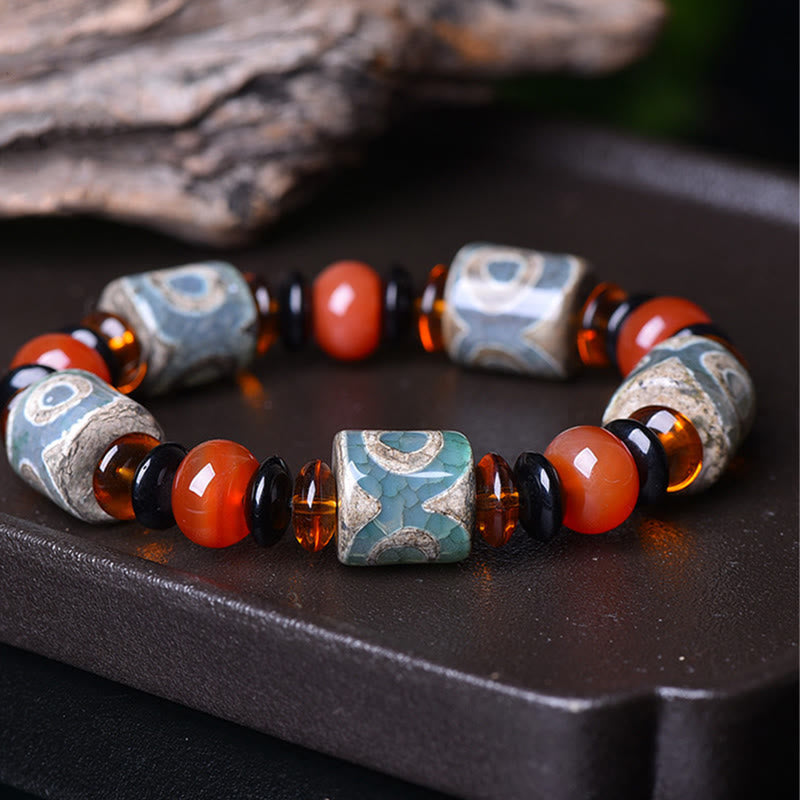 Pulsera tibetana de cuentas Dzi de tres ojos con piedras de Buda y ágata para la protección y la felicidad
