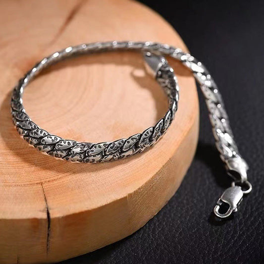 Pulsera de cobre con diseño de textura punteada y piedras de Buda