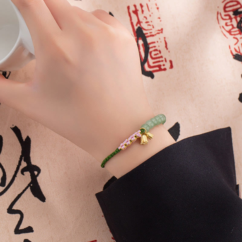 Pulsera trenzada con cuentas de jade de Buda, hecha a mano, con amuleto de lirio de los valles y la suerte