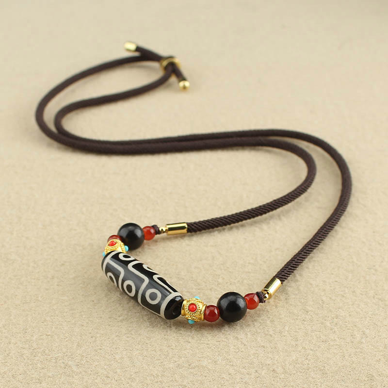 Collar con colgante de hilo con cuentas Dzi tibetanas de nueve ojos y piedras de Buda con bendiciones de protección