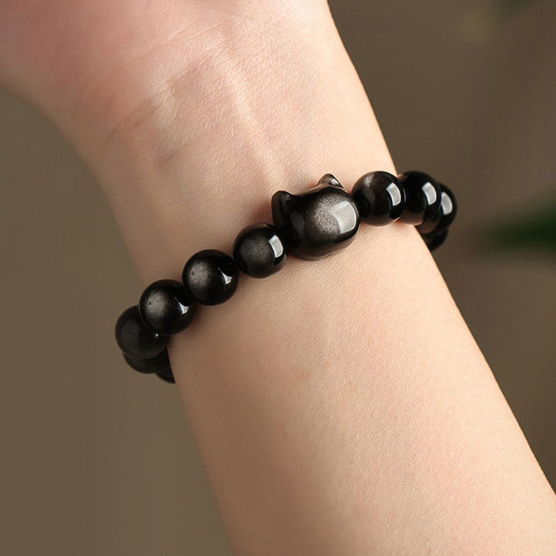 Pulsera de protección con piedras de Buda, obsidiana dorada y obsidiana plateada con brillo, con forma de pata de gato de la suerte.