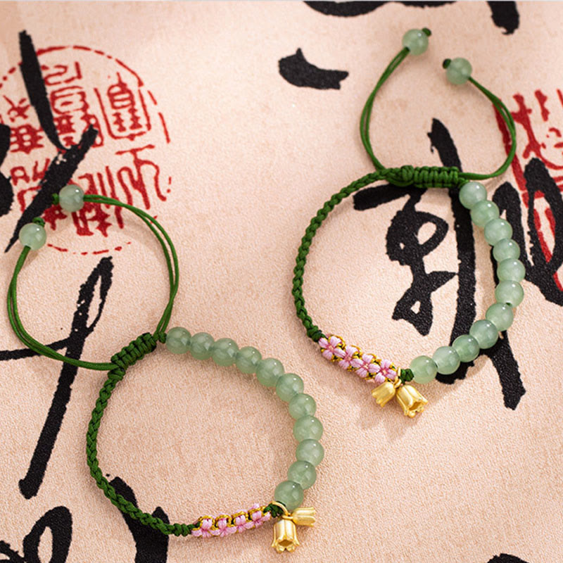 Pulsera trenzada con cuentas de jade de Buda, hecha a mano, con amuleto de lirio de los valles y la suerte