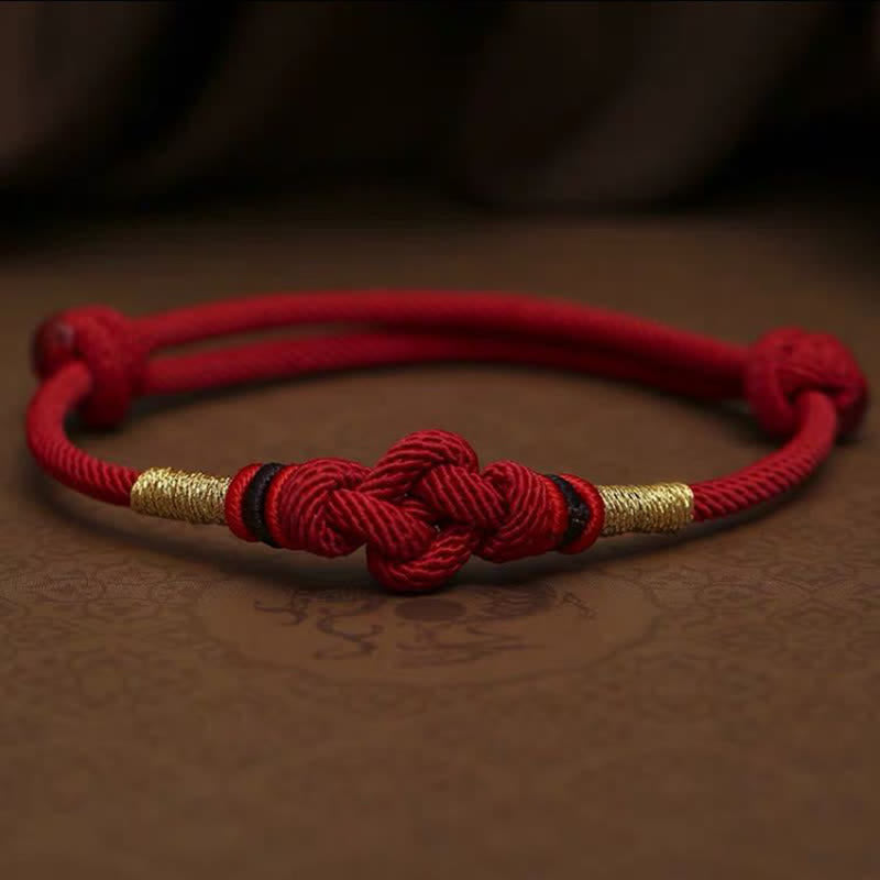 Pulsera trenzada con nudo de la fortuna y jade rojo de Buda