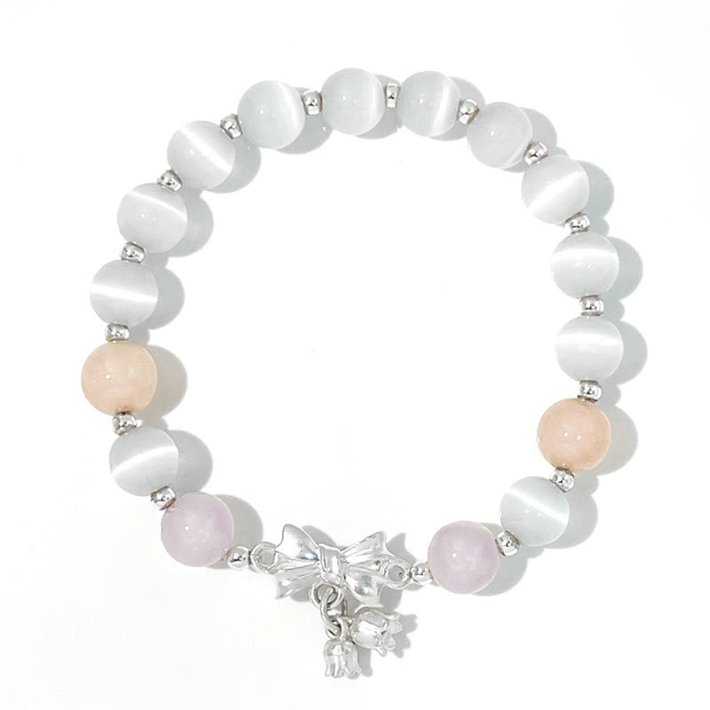 Pulsera con dije de roseta de amatista y lavanda con ojo de gato y piedras de Buda