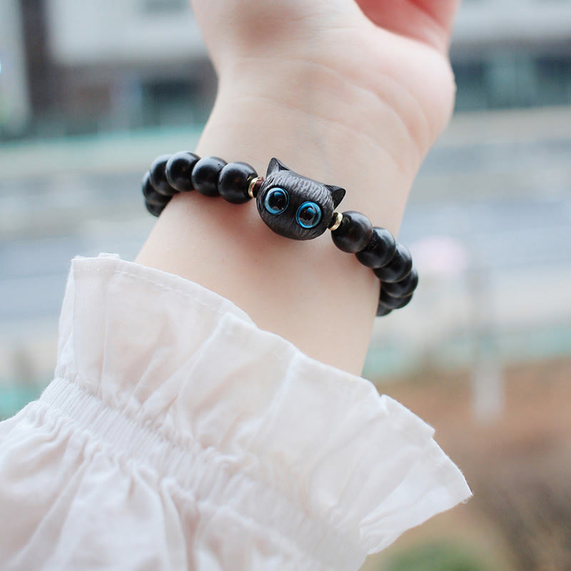 Pulsera de la paz con piedras de Buda, madera de ébano y sándalo verde, con un bonito gato