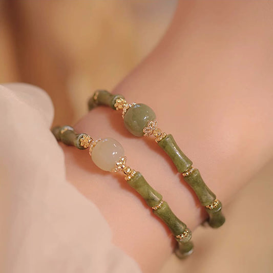 Pulsera de la suerte con diseño de bambú y peridoto de jade hetiano bañada en cobre de 14 quilates con piedras de Buda