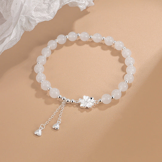 Pulsera de la suerte con pétalos de flor de durazno y jade blanco de Buda