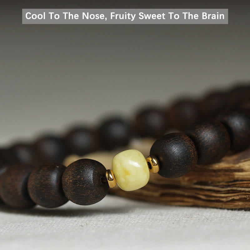 Buddha Stones Seltenes Brunei-Adlerholz-Bernstein-Armband mit Balance, Frieden und Ruhe