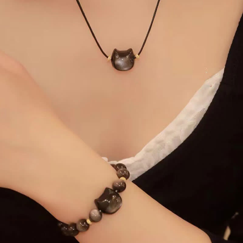 Pulsera de protección con piedras de Buda, obsidiana dorada y obsidiana plateada con brillo, con forma de pata de gato de la suerte.