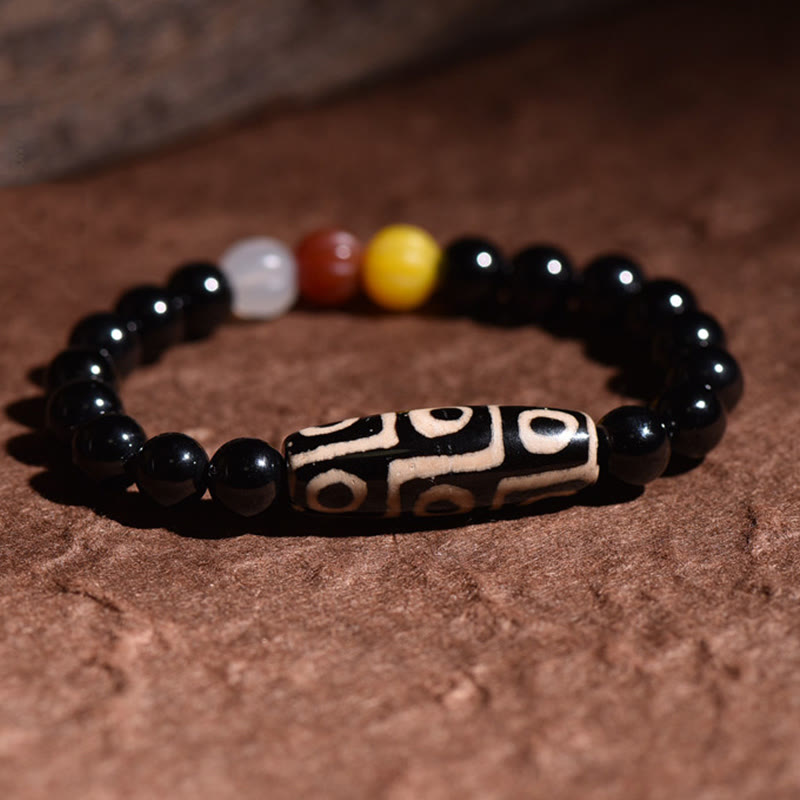 Pulsera tibetana de cuentas Dzi de nueve ojos con piedras de Buda y poder de la riqueza