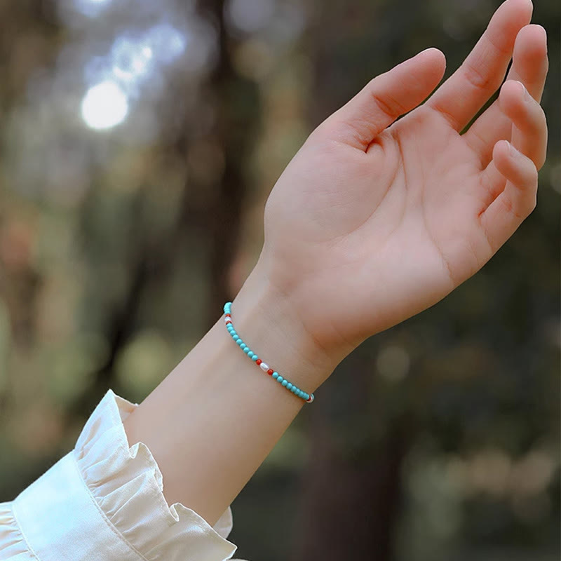 Pulsera protectora de cuentas pequeñas de ágata roja turquesa y perla de Buda