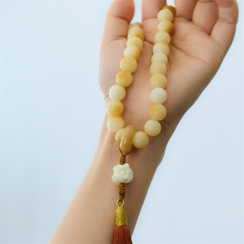 Mala de muñeca con borla de armonía y amuleto de león danzante de marfil con semillas de bodhi naturales de Buda