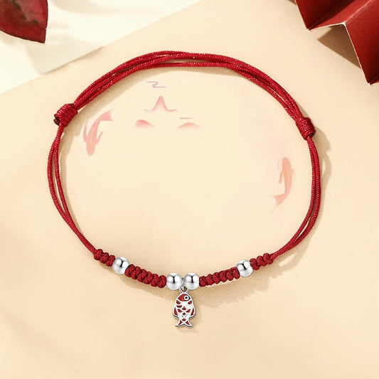 Pulsera trenzada roja artesanal de plata de ley 925 con piedras de Buda y pez koi para la suerte y la riqueza.