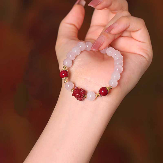 Pulsera de zorro de nueve colas con cinabrio de cristal rosa natural de Buddha Stones
