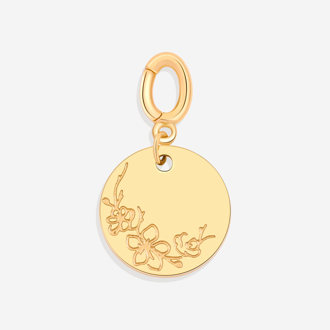 Dije de disco con flor de nacimiento grabada