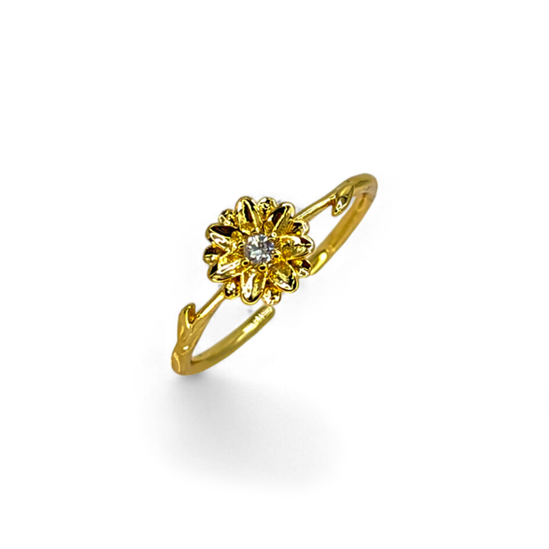 Delicado anillo de oro con flor de nacimiento