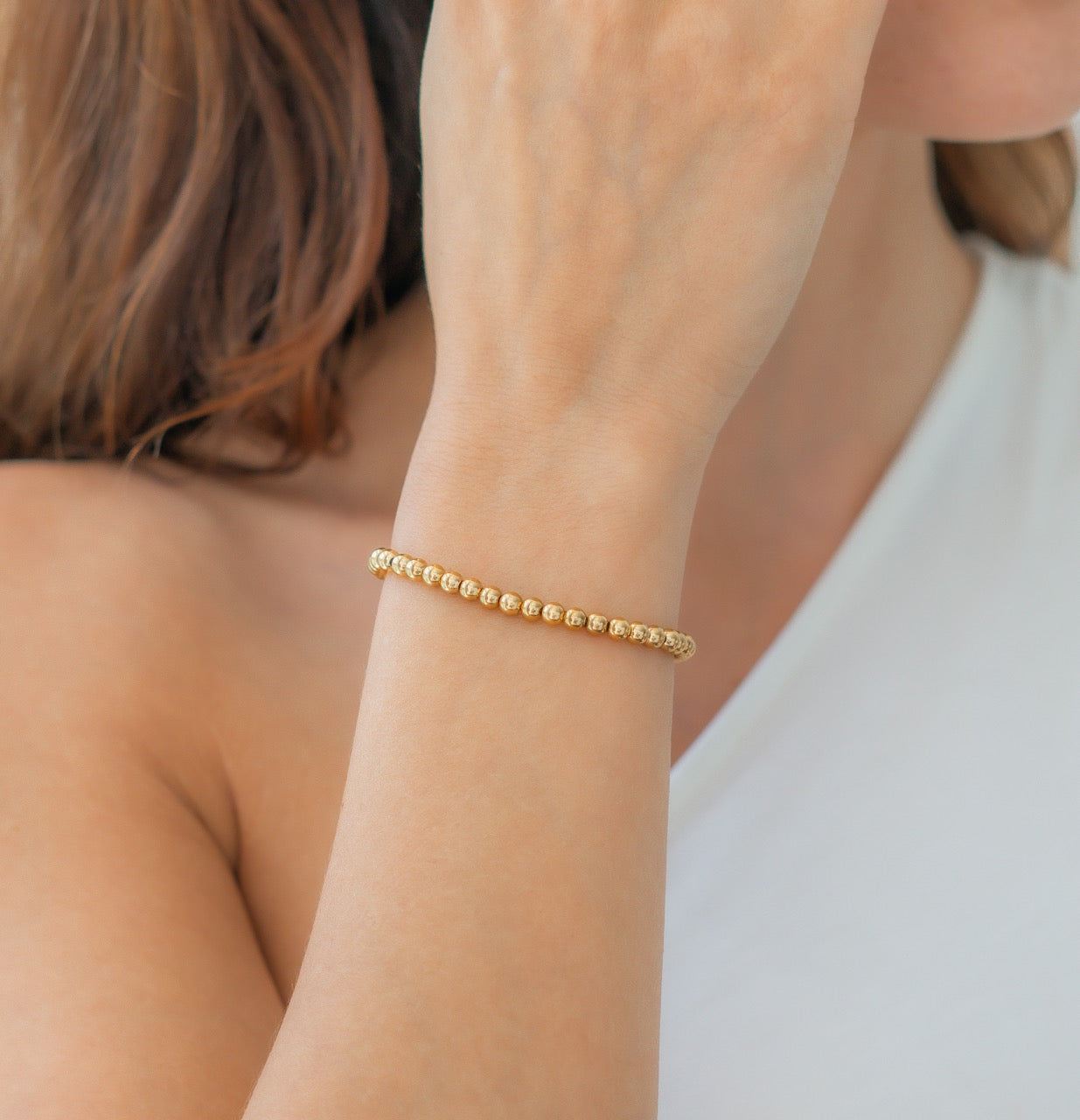 Zierliches goldenes Stapelarmband