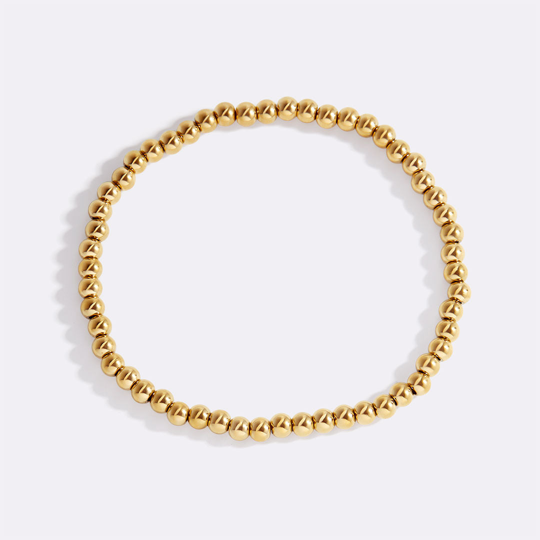 Zierliches goldenes Stapelarmband