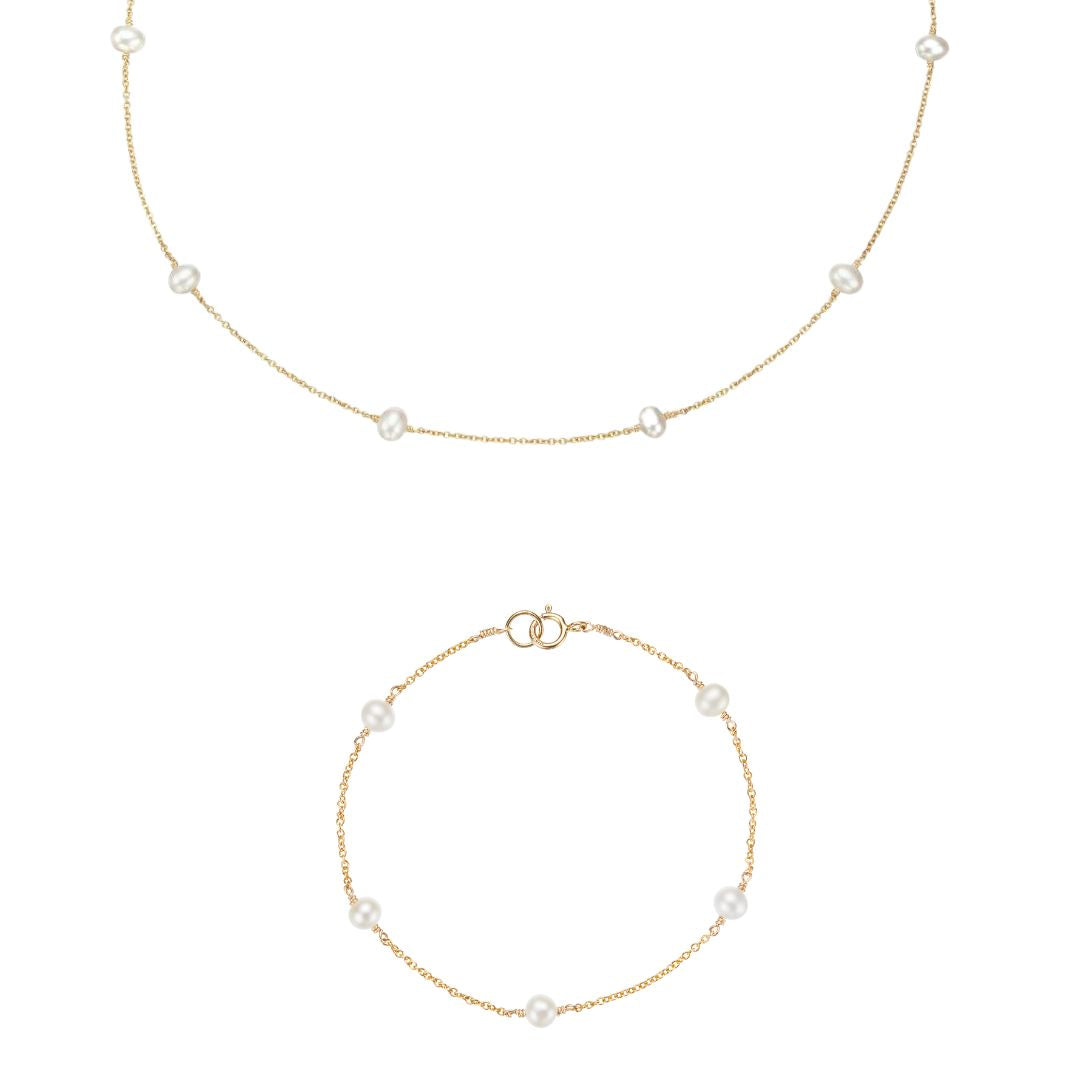 Geschenkset aus goldenem Halsband mit zehn Perlen und Armband mit fünf Perlen