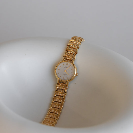 Reloj vintage Tissot suizo con tejido de cesta dorado